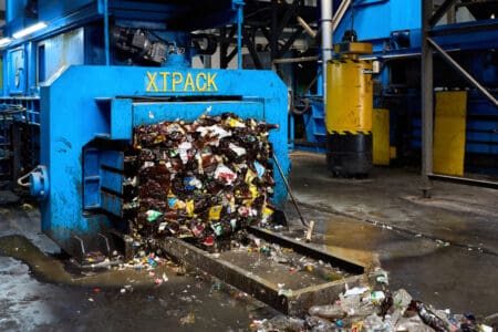 An XTPack baler used to compact plastics and other materials