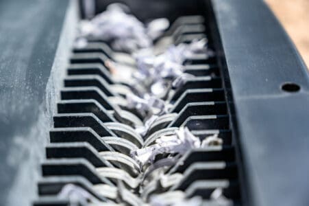 Close up of a pierce-and-tear shredder