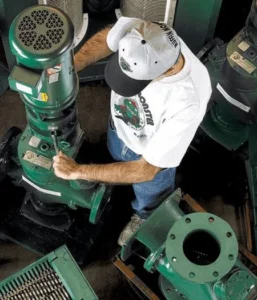 Man servicing Muffin Monster equipment